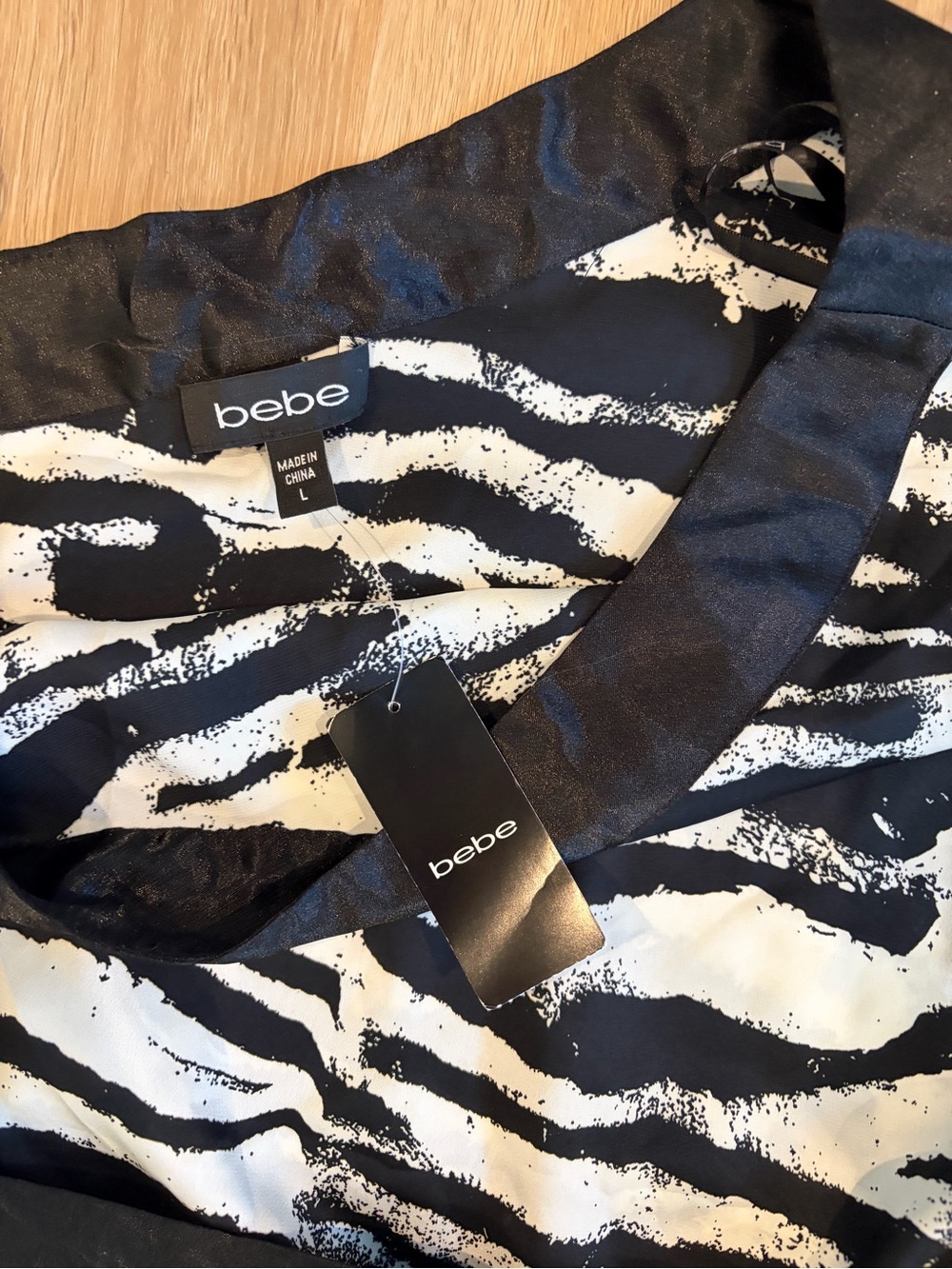 bebe Black & White Zebra-Print One-Shoulder Blouse with Satin Waist Tie - Picture 2 of 4
